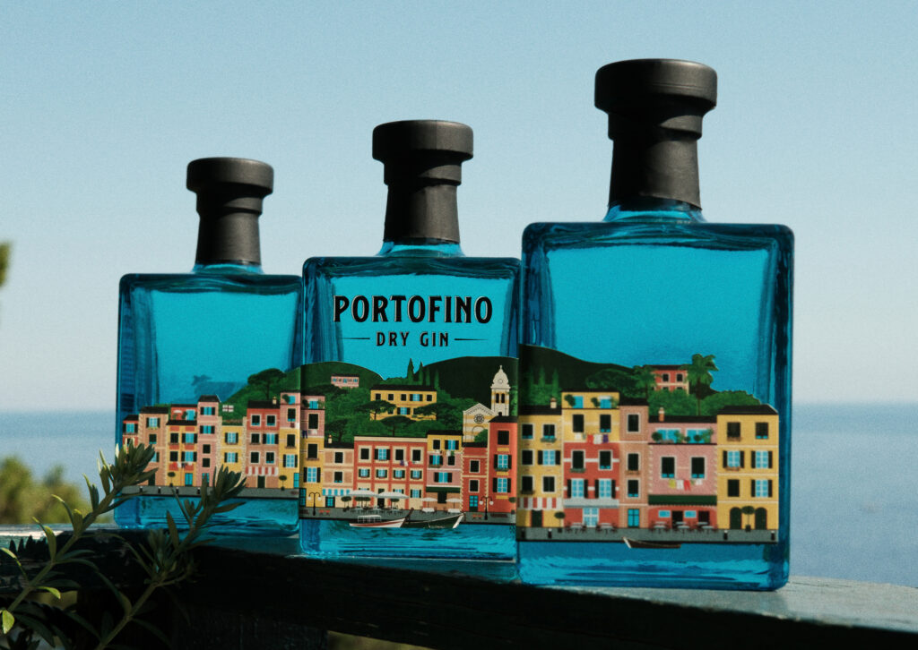trends in the alcohol market, 3 bottles of portofino dry gin arranged to show the skyline of Portofino village