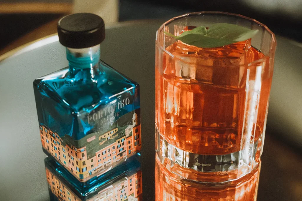 Portofino Dry Gin and a classic cocktail in a stylish setup ideal for winter drinks.