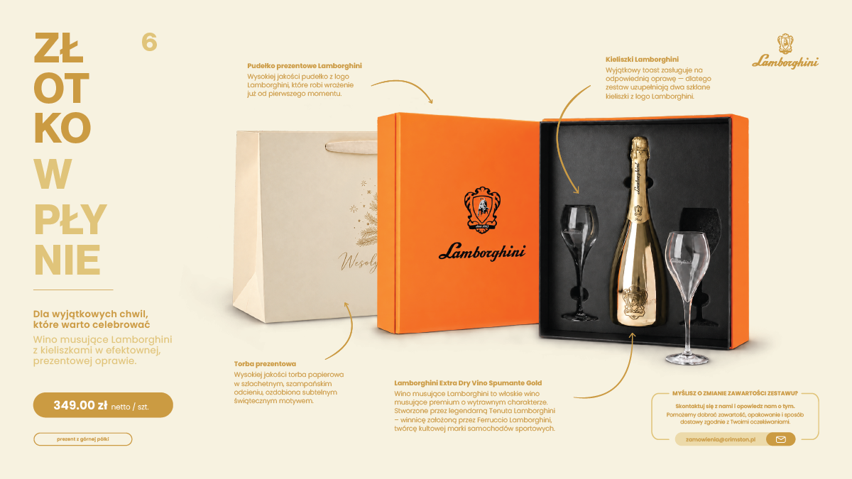 Zestaw prezentowy Złotko w Płynie z winem musującym Lamborghini Gold i dwoma kieliszkami w pomarańczowym pudełku.